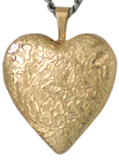 gold floral pattern heart locket