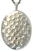 sterling 20 oval locket with hammer pattern