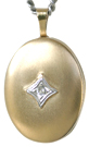 gold oval locket with diamond