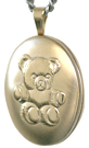 Gold embossed teddy bear oval locket