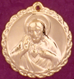 C461 gold sacred heart medal